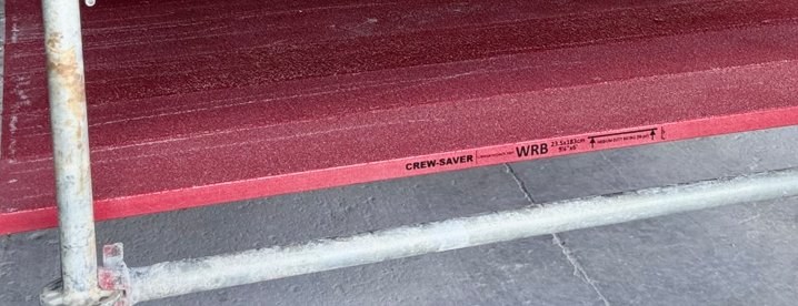 Crew-Saver composite scaffold plank installed on a live jobsite